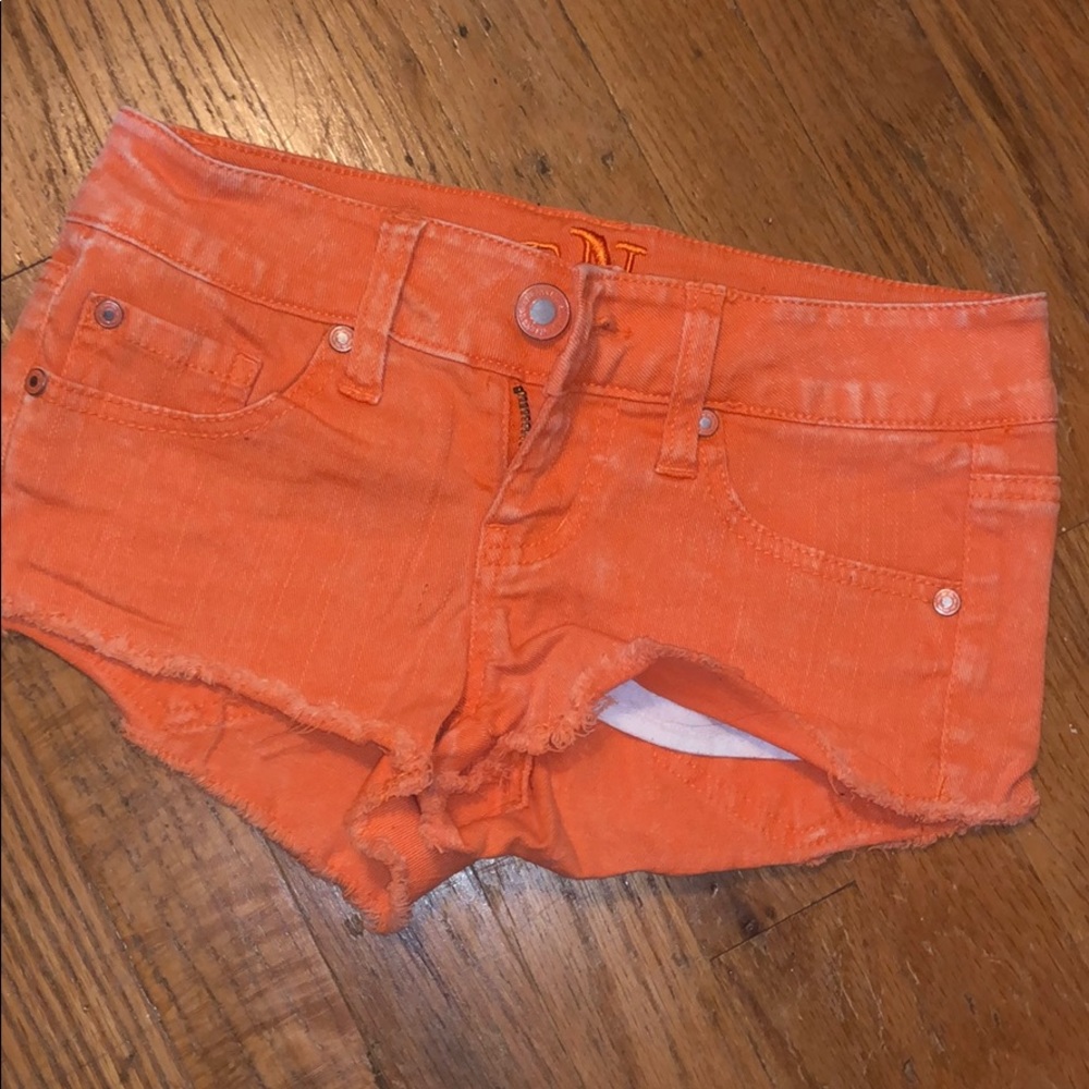 Orange denim shorts